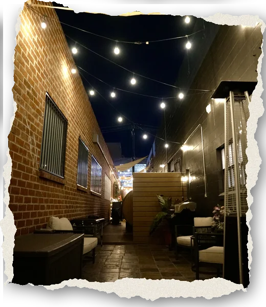 The string-lit courtyard walkway at The Recording Club